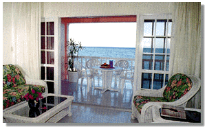 Your vacation escape to the tropics! Located right on the beach, in the heart of San Pedro on the beautiful island of Ambergris Caye, Belize.  All of San Pedro's small town charms await you at the doorstep. You'll be cooled by the trade winds off a coral blue Caribbean Sea while enjoying the peace of your own private balcony overlooking the longest coral reef in the western hemisphere.