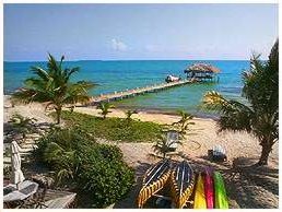Inn at Robert's Grove, situated on
a perfect beach on the Placencia peninsula of Belize. Luxurious 
accommodations and facilities, the ideal choice for a tropical vacation