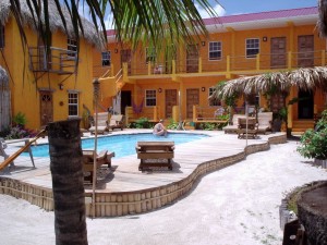 Caye Caulker Belize - Seaside Cabanas - Picturesque thatch-roofed, cabanas 50 feet from the Caribbean in beautiful Caye Caulker, Belize. Cabanas come with private bath, personal refrigerator, coffee maker, phone and cable TV.
